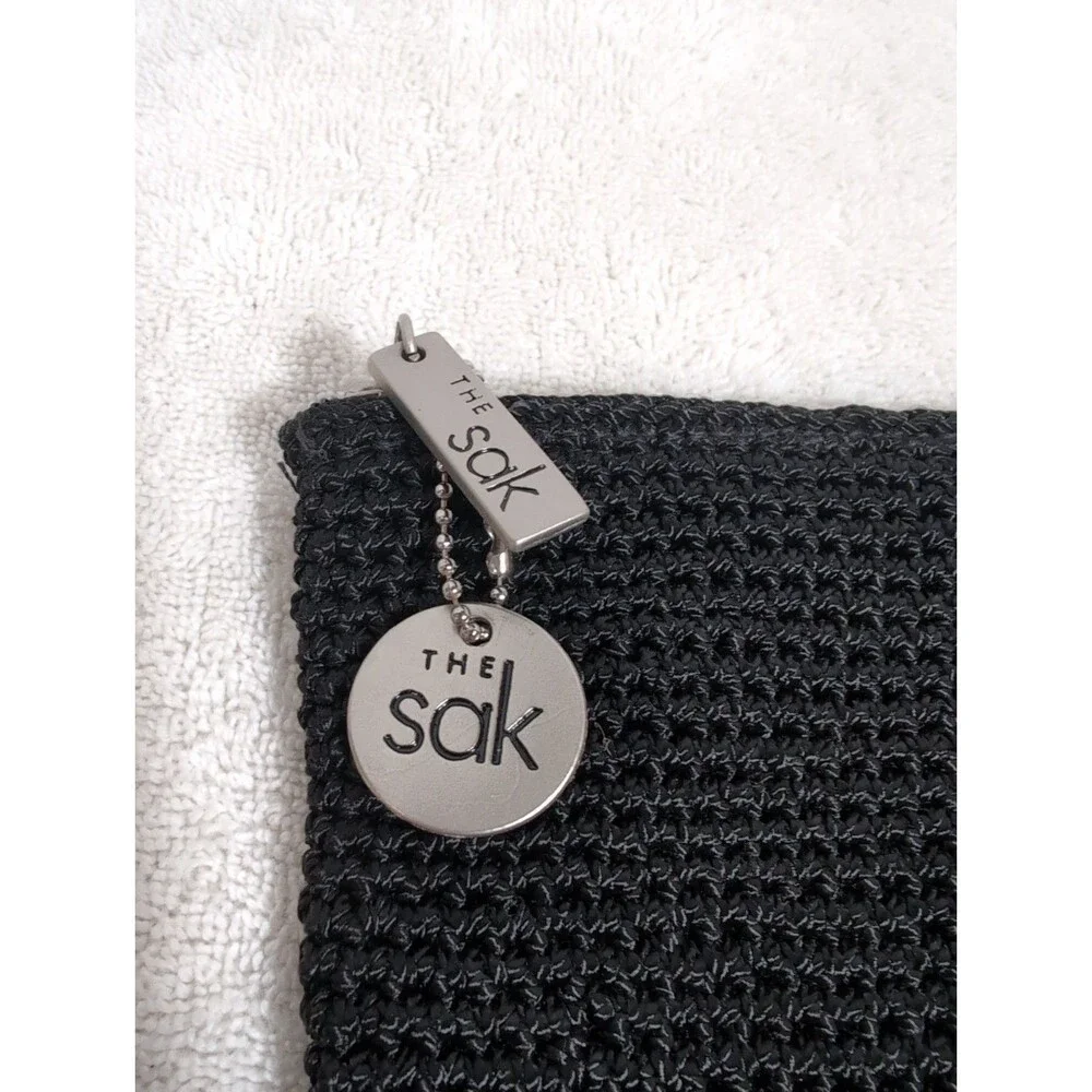 THE SAK MINI PURSE/CLUTCH WITH ZIPPER CLOSURE INSIDE POCKET AND CHARM BLACK EUC